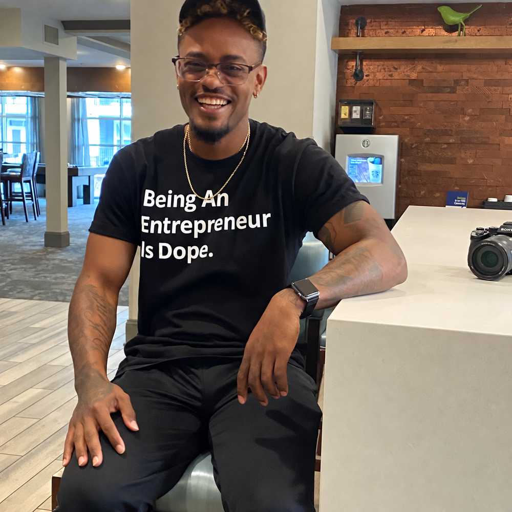 Customer wearing Entrepreneurship Is Dope products